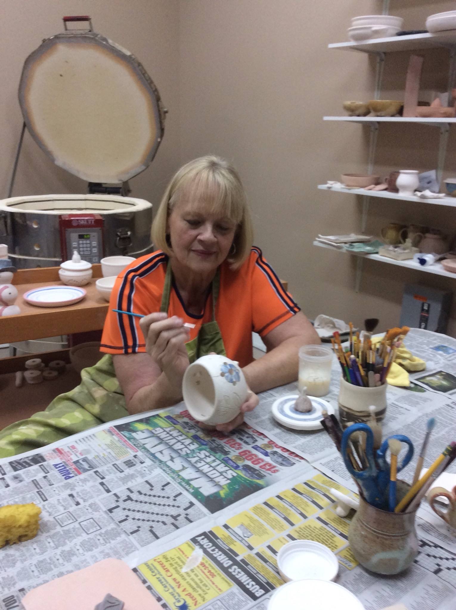 Students working on pottery